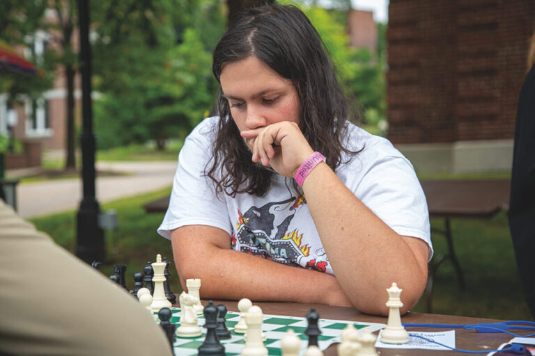 student playing chess